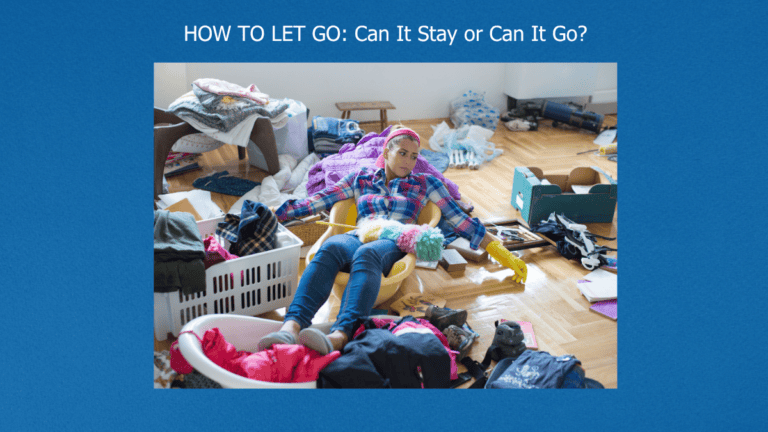 woman sitting amoung her possessions overwhelmed